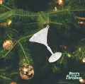 Detailed view of a clear acrylic martini glass ornament on a festive Christmas tree - Wine Glass Style (2025)