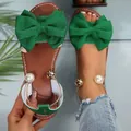 Stylish green bow sandals with pearl accents and flat open-toe design for women - Green