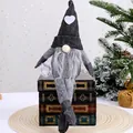 Handmade grey knitted faceless Christmas gnome doll with long hanging legs and heart motif - Braids Style (Female) / Black