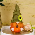 Harvest festival gnome plush toy with green hat and orange beard holding a pumpkin - Green Hat Style