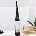 Festive Christmas gnome wine bottle cover featuring green felt hat and snowflake embroidery - Green