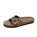 Close-up detail of leopard print slide sandal with large silver buckle and cork sole - 35 / Brown
