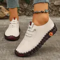 Casual white leather flat shoes with hand-stitched contrast sole detailing - 35 / Beige