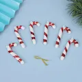 Detailed view of red and white plastic candy cane Christmas tree ornaments with gold ties - 7cm (ai-6 Pieces/Pack) / Red