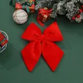 Detailed view of a large red velvet Christmas bow ornament with festive gift decorations - Red 40 (328.10) / 20*25cm / Red