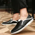 Casual black and white leather loafers for men with a breathable slip-on design - 38 / Black