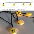 Gruselige Halloween Augapfel Lichterkette 1,5 m Länge mit 8 LEDs für die Festdekoration - Augapfel-Lichterkette