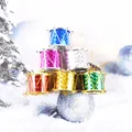 Close-up of colorful laser mini drums as festive Christmas tree ornaments displayed on white snow. - 4cm / Set of 6