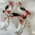 Detailed view of handmade Halloween ghost garland featuring mini pumpkins, bats, and a black crow. - Ghost Long String (With Legs/2 Bells/1 Crow) / 120cm