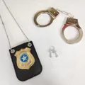 Detailed view of kids toy police badge accessory set with PU holder and metal handcuffs - Badge And Handcuffs Set / Halloween Accessories