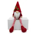 Close-up of a festive Christmas gnome plush with long striped legs and holly hat - Red