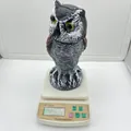 Realistic rotating owl decoy bird deterrent on scale showing its total weight detail - Rotating Round Ear Style (PE Bag)