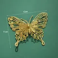 Decorazione farfalla dorata glitterata per Natale con misure di dimensione 12x11cm - Oro