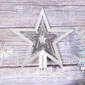 Elegant silver electroplated five-pointed Christmas tree star topper on a rustic wood backdrop - 10cm / Silver
