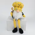 Detailed view of a long-legged bee chef gnome plush ornament sitting on a white wooden block - 16*14*39 / Cute Boy