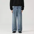 Full view of men's loose fit straight-leg jeans in washed light blue denim - S / Bottoms / Light Blue