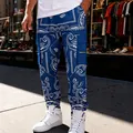 Men's blue paisley print cargo pants in a loose streetwear hip-hop style fit profile. - S / Bottoms / Sapphire Blue