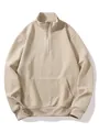 Detailed view of beige waffle knit half-zip sweatshirt showing texture and collar - S / Tops / Khaki