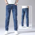 Slim fit men's blue stretch denim jeans shown in front and back views for summer wear - 28 / Bottoms / Dark Blue