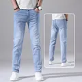 Men's light blue slim fit straight leg stretch denim jeans in a summer thin style - 28 / Bottoms / Light Blue