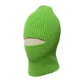 Close-up of neon green knitted balaclava showing ribbed texture and eye opening. - Verdant