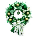 Festive green St. Patrick's Day wreath featuring gold ornaments and shamrock bow - With Ball