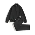 Close-up of black waffle knit texture on men's half-zip sweatshirt and pants set - S / Top And Bottom / Black