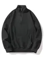 Detailed view of black waffle texture on men's half-zip pullover sweatshirt - S / Tops / Black