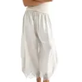 Close-up of white wide-leg harem pants featuring delicate lace trim and drawstring waist. - XS / Bottoms / White