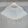 Elegant white beaded shawl cape featuring long tassels, perfect for wedding or evening dresses. - White
