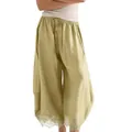 Detail showing the delicate lace trim and loose fit of these sage green curved pants. - XS / Bottoms / Matcha Green