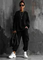 Black oversized sweatshirt and cargo pants set for women styled with white sneakers - S / Top And Bottom / Long Sleeve Black