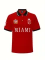 Dettaglio di una polo rossa a maniche corte da uomo con stampa grafica di Miami - XS / Top / Rosso