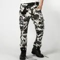 Men's white and black camouflage cargo pants with multiple pockets and belt. - 40 / Bottoms / Black Hawk Camouflage (1866)