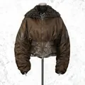 Detailed view of an American vintage cropped jacket with ruched sleeves and faux fur collar - S / Tops / Brown