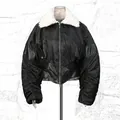 Detail view of black retro jacket with white faux fur collar and unique ruched sleeves design - S / Tops / Black