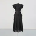 Detailed view of black retro romantic ruffled top and high waist lace hem skirt suit - S / Top And Bottom / Black