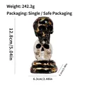 Gothic resin skull candle holder with black and white stacked design for Halloween. - Black