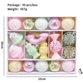 Set de 45 adornos navideños en tonos pastel con variadas formas festivas para el árbol - Paquete de 45 Piezas / Multicolor