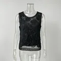 Intricate floral beading detail on a black sheer mesh sleeveless luxury top for women - S / Tops / Black