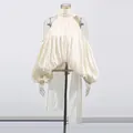 Elegante weiße Chiffonbluse mit schulterfreien Ausschnitten und Rüschen-Laternenärmeln. - S / Oberteile / Aprikose