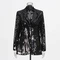 Elegant front detail of a shimmering black sequined blazer for women with V-neck design - M / Tops / Black