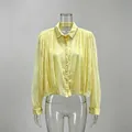 Detail of French style yellow lace mesh blouse with beaded collar - Yellow