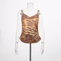 Detailed view of women's tiger print camisole top with luxury rhinestone straps. - S / Tops / Brown