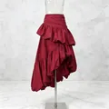 Detailed view of a burgundy high-waist skirt with layered ruffles and asymmetric hem - S / Red