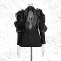 Elegante zwarte blazer met dramatische ruches op de schouders en een diepe V-halslijn. - S / Tops / Zwart