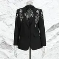 Elegant black women's blazer featuring heavy rhinestone and beaded shoulder embellishments - M / Tops / Black