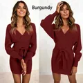 Detail showing the burgundy V-neck knitted dress with waist tie and long sleeves - S / Dresses / Burgundy