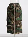 Close-up of high-waist camouflage cargo skirt with multi-pocket and zipper details - S / Bottoms / Camouflage