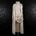 Details of 3-piece knit set featuring a long coat and 3D floral ruffle skirt - One Size / Set / Apricot